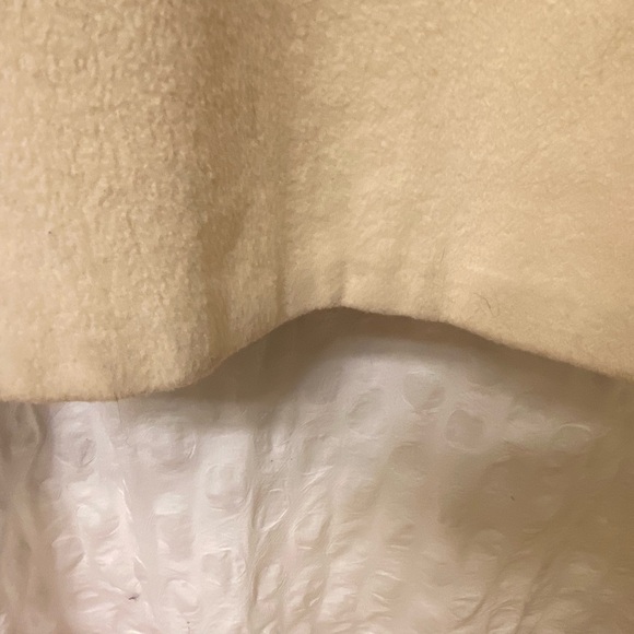 Rock your vintage lifestyle with this Herman Kay white wool coat.Size 14. - Picture 11 of 14